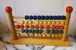 Wooden abacus with 5 rows of beads