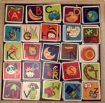 Alphabet magnets with magnetic/chalk board
