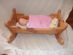 Doll, Clothes, Cradle and Bedding