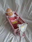 Baby doll and cot
