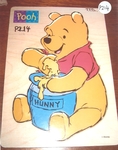 Winnie the Pooh with honey pot