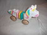 Wooden pull along unicorn