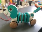 Wooden pull along dog
