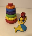 Duplo Rabbit on Skateboard Rattle, a Fish Rattles and Stacking Rings Toy