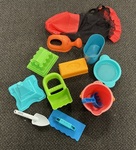 Hape Sandpit toys in black and red bag