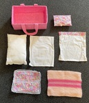 Pink Portacot with beddings