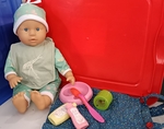 I165: Baby doll soft body- with accessories