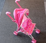 I183: Pink stroller with canopy