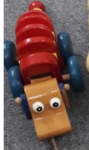 B108: Pull along wooden dog