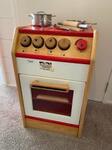 Stove--Red Wooden & Cooking Implements