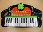 Black & Orange Electronic Keyboard - Kawasaki