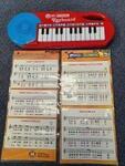 Pad Tunes Keyboard & Music Sheets