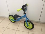 Blue Huffy balance bike