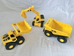 MEDIUM CAT TRUCKS 