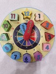 SHAPE SORTING CLOCK PUZZLE