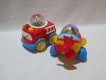 ROLL-A-ROUNDS AIRPLANE AND FIRETRUCK