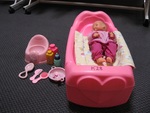 PLASTIC CRADLE & DOLL SET