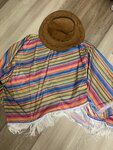 Poncho and cowboy hat