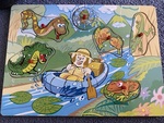 Canoeing on the river 6 piece peg puzzle