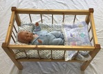 Woden cot with Baby 