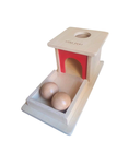 Object permanence box with balls