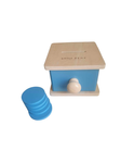 Object permanence box with coins