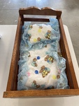 Wooden dolls bed 