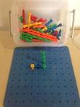 Pegboard with pegs