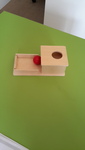 Montessori object permanence toy 