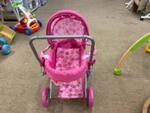 Pink dolls pram