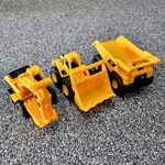 Three Construction Vehicles